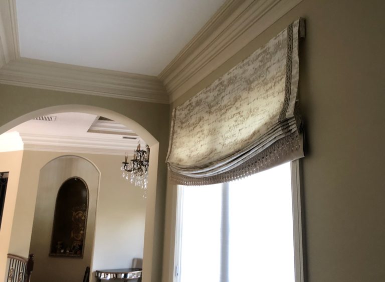 an elegant relaxed Roman shade fabricated by Nez Designs
