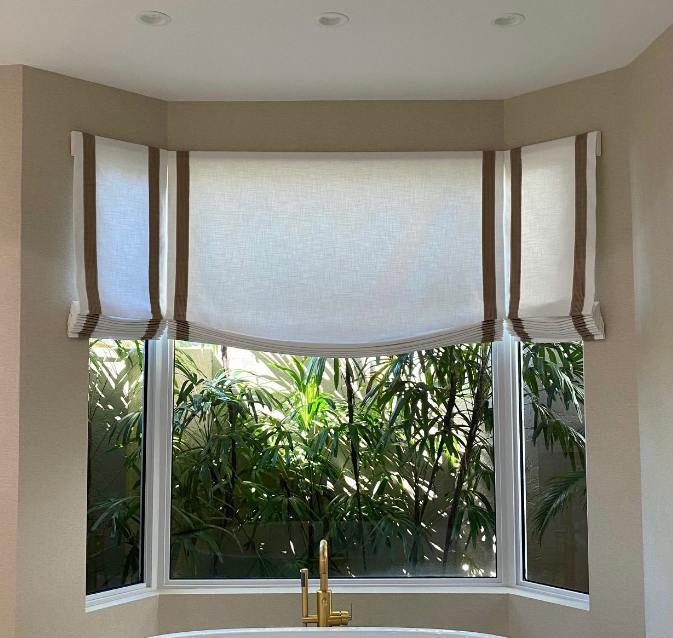 custom top treatments on a bathroom bay window