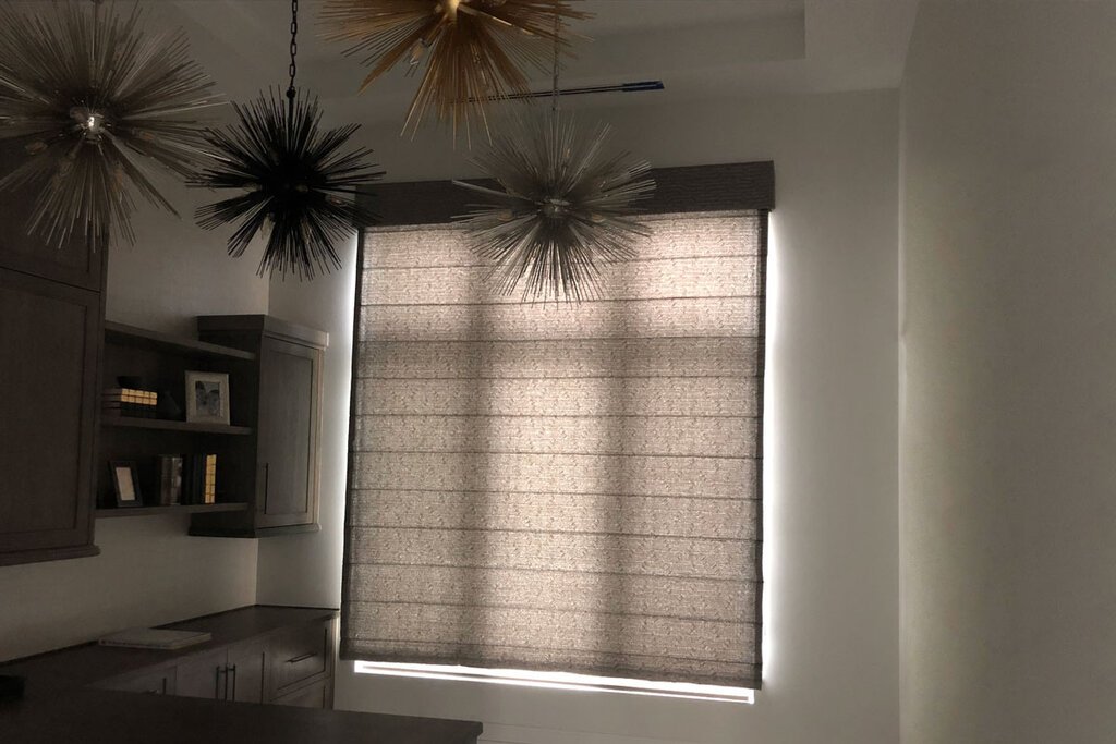 custom roman shades in a home office